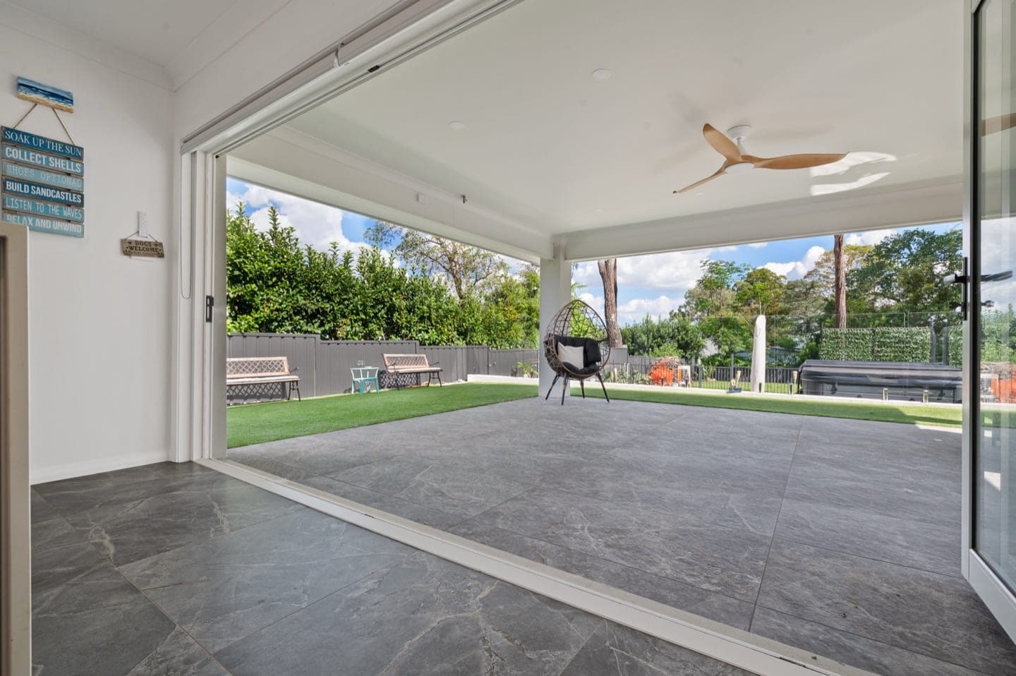 Patio tiling with weather-resistant tiles in Sydney